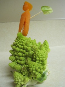 A carrot man conquering cauliflower mountain. I'm a very serious chef...